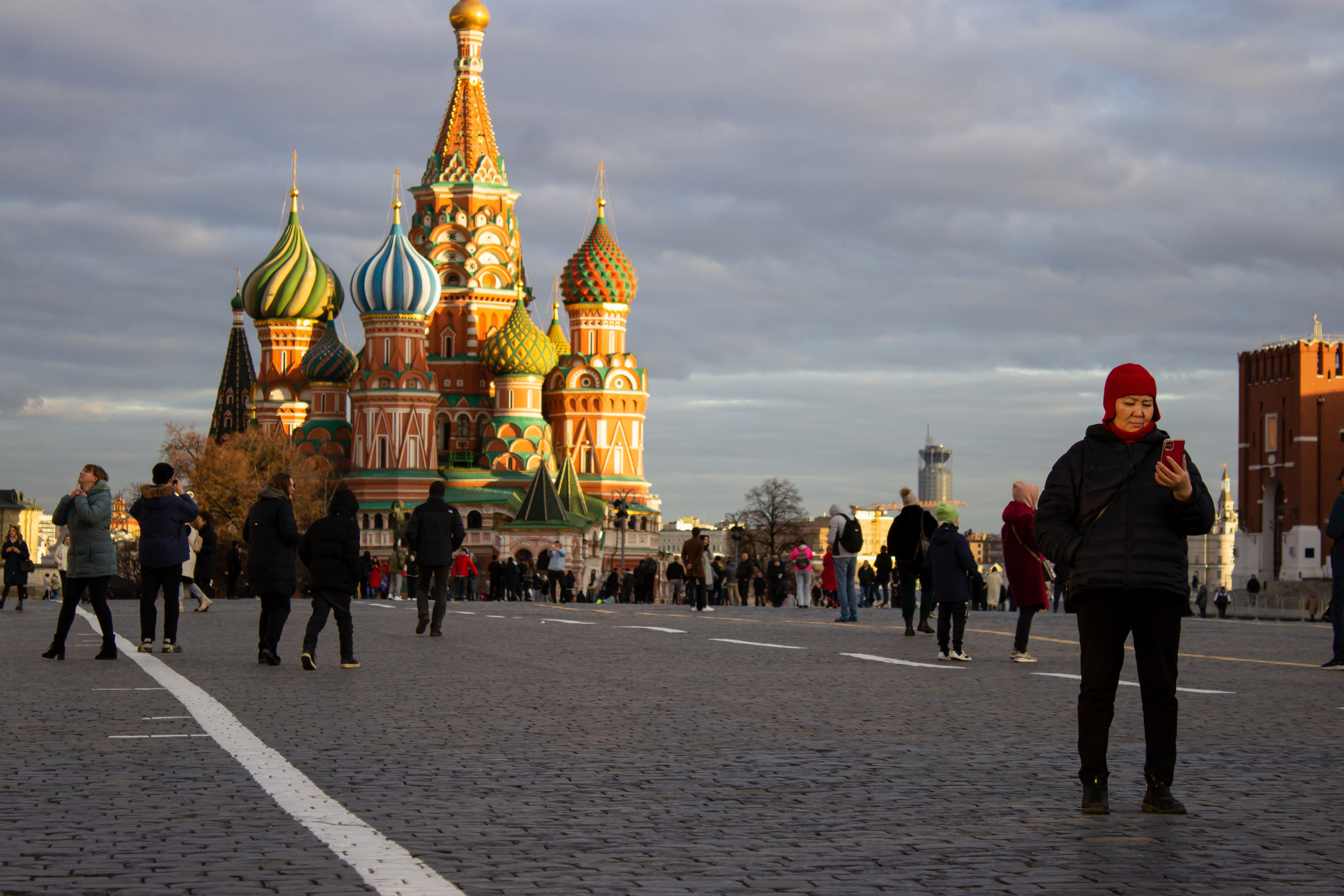 March 22, 2023, Moscow, Russia: People walk on the Red Square in Moscow, with Saint Basil's Cathedral in the background.